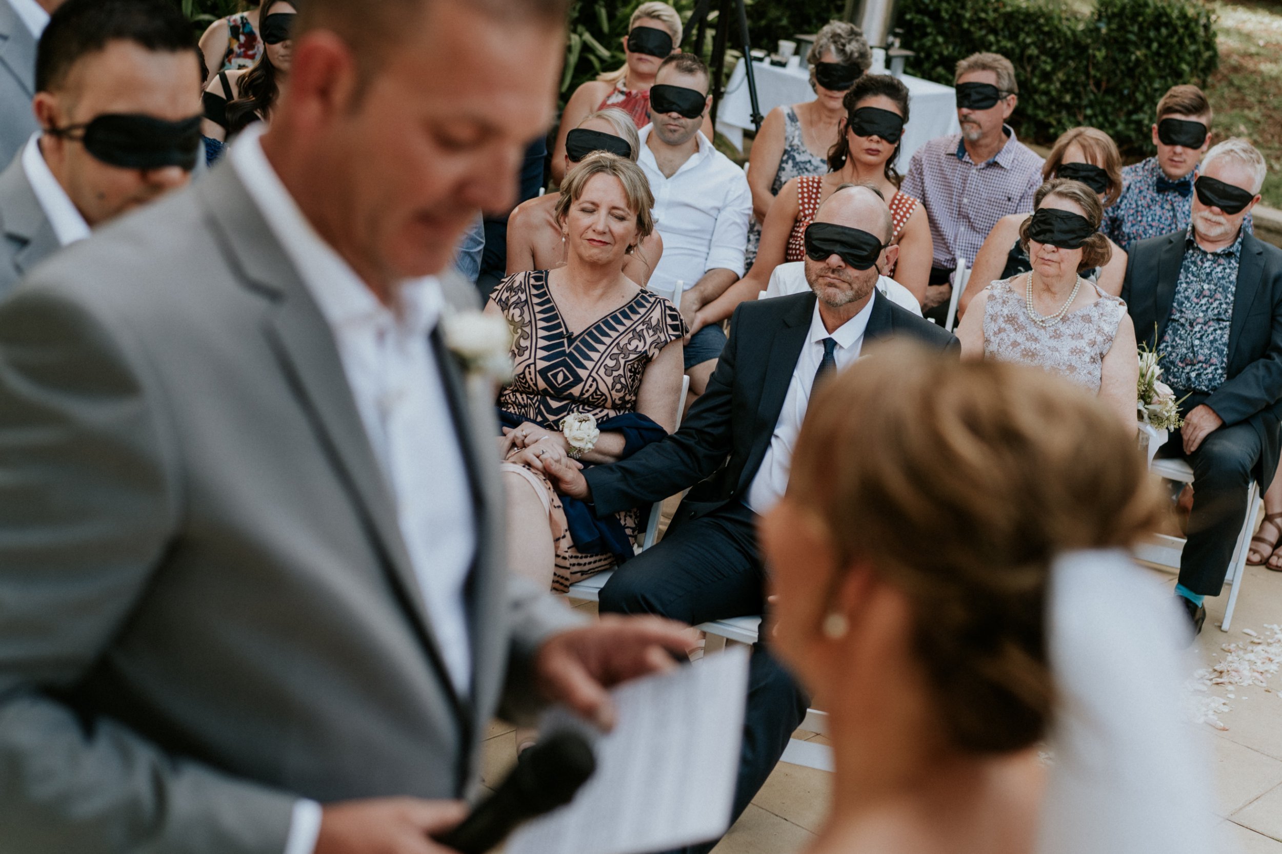 Wedding guests wear blindfolds at blind bride's wedding Mark Pawlyszyn