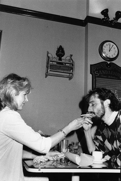 A married couple light a cigarette at Caph's cafe, Manuka, in 1987. Picture: Canberra Times archives