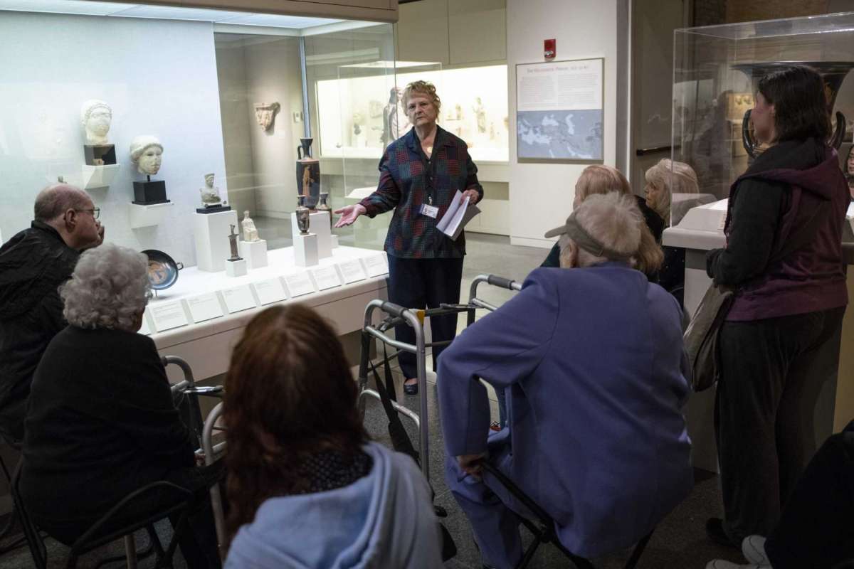 Susanne O’Brien, a docent at the San Antonio Museum of Art, describes the depiction of the Greek goddess Nike during a sensory tour on Saturday, March 7, 2020.