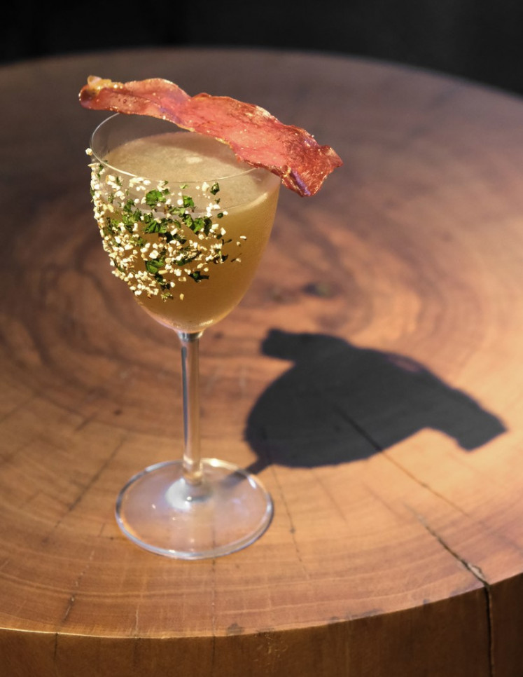 Meaty flavor: For those who like meat in their drinks, Eat Me restaurant makes a cocktail that tastes like the warm salad dish moo larb.
