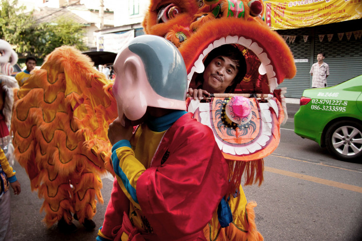 Street performance: The Sino-Thais are the majority population of Bangkok. But as society changed, Chinese opera and lion dances started to be performed by a later group of indigenous migrants from Thailand’s northeast region. 