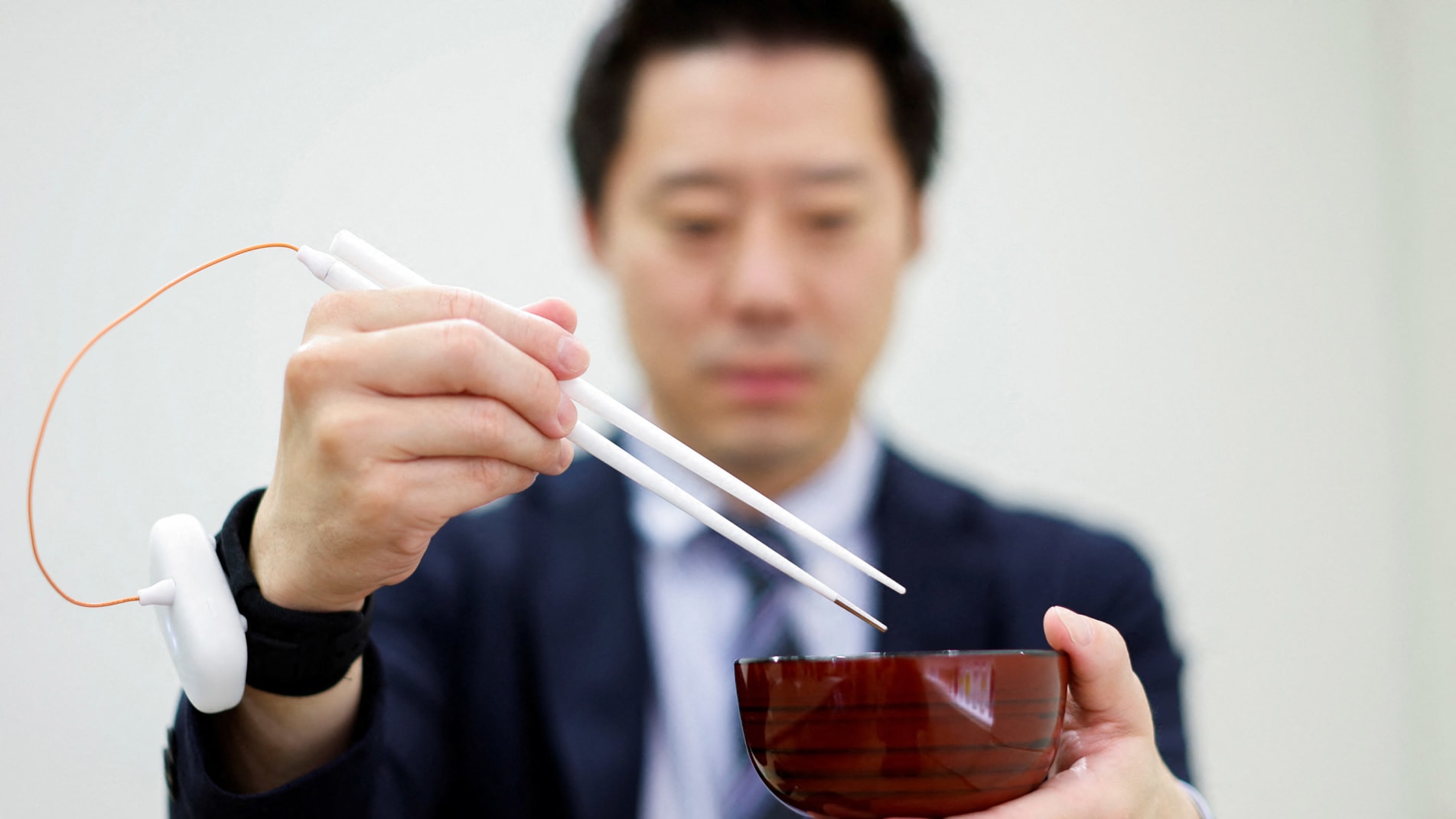 Researchers in Japan develop electric chopsticks to enhance salty taste in foods | CNN Style